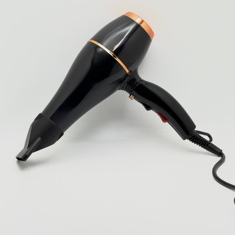 سشوار خانگی مدل MX-8889 با توان 9000 وات، موتور AC، تنظیم دما و سرعت دو حالته، متمرکزکننده باریک، خشککنندگی قوی، حجمدهندگی، پخش یکنواخت گرما و کاهش وز مو، مناسب حالتدهی چتری