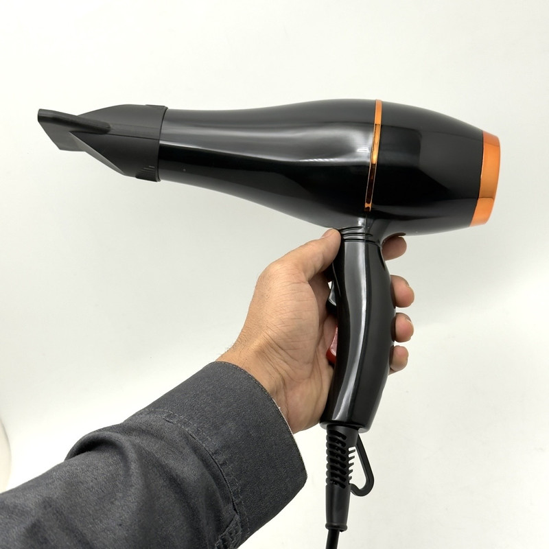 سشوار خانگی مدل MX-8889 با توان 9000 وات، موتور AC، تنظیم دما و سرعت دو حالته، متمرکزکننده باریک، خشککنندگی قوی، حجمدهندگی، پخش یکنواخت گرما و کاهش وز مو، مناسب حالتدهی چتری