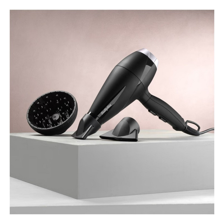 سشوار حرفهای بابیلیس مدل Style pro 2100 وات، تنظیمات دما و سرعت دو حالته، همراه با سه سری صافکننده، حجمدهنده و متمرکزکننده، پخش یکنواخت گرما و تقویت فر طبیعی مو