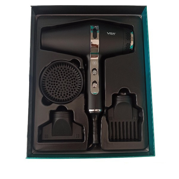 سشوار حرفهای 2200 وات وی جی ار مدل V-451، موتور AC، وزن 1200 گرم، المنت سرامیک تورمالین، دارای سری دیسپانسر، متمرکزکننده پهن، سری شانهدار با ویژگی فرکنندگی، صافکنندگی، حجمدهندگی، با قابلیت عملکرد توربو، خشککردن سریع