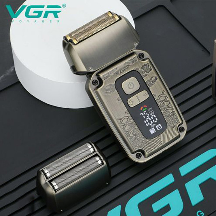 ماشین اصلاح موی صورت وی جی ار مدل V-337 با تیغه کربن استیل، عملکرد توربو، قابلیت تنظیم سرعت، استفاده خشک و مرطوب، اصلاح با شماره صفر، باتری لیتیومی 800 میلیآمپر، شارژ با کابل USB، نمایشگر میزان شارژ و سرعت موتور، دارای تیغه اضافی تریمر