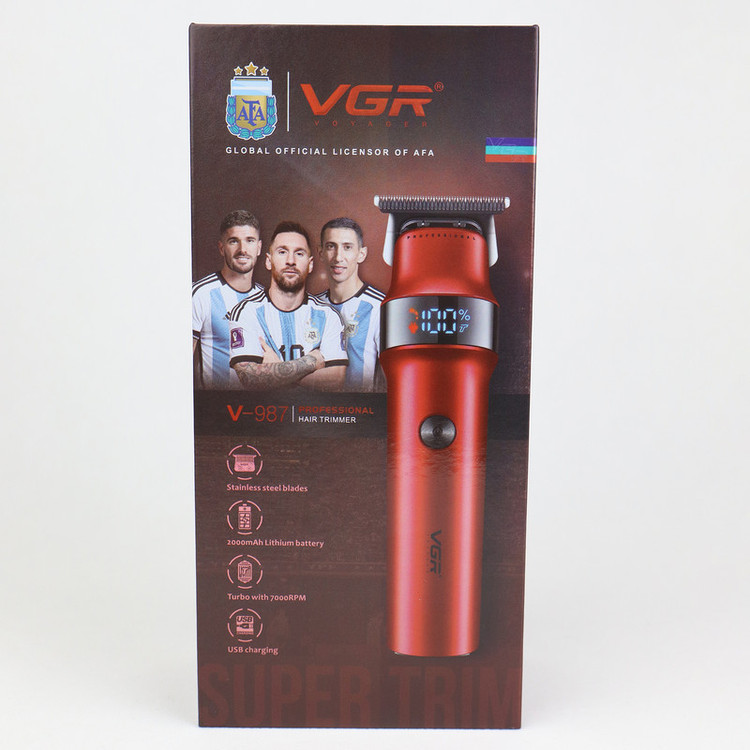 ماشین اصلاح موی سر و صورت وی جی ار مدل V-987 با تیغه استیل ضد زنگ، عملکرد توربو، قابلیت اصلاح با شماره صفر، نمایشگر میزان شارژ، طراحی ارگونومیک، همراه با سه شانه راهنما و برس تمیزکننده