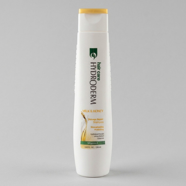 شامپو مو هیدرودرم مدل Milk and Honey حجم 250 میلیلیتر، تقویتکننده، ترمیمکننده، براق کننده، مناسب موهای آسیب دیده، حاوی عصاره شیر و عسل