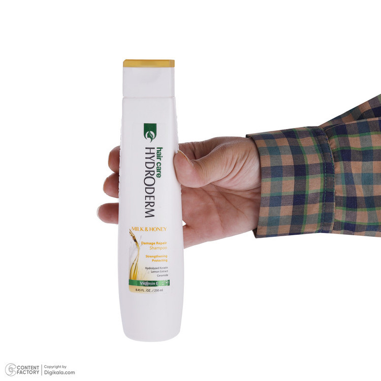 شامپو مو هیدرودرم مدل Milk and Honey حجم 250 میلیلیتر، تقویتکننده، ترمیمکننده، براق کننده، مناسب موهای آسیب دیده، حاوی عصاره شیر و عسل
