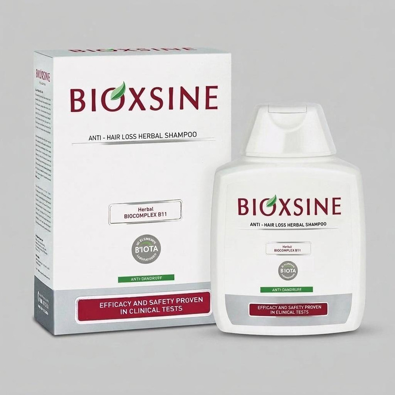 شامپو ضد ریزش و ضد شوره بیوتا مدل BIOXSINE حجم 300 میلی‌لیتر، تقویت‌کننده و تغذیه‌کننده مو با ویتامین‌ها و مواد معدنی، مناسب انواع مو، کاملاً گیاهی و بدون مواد رنگی