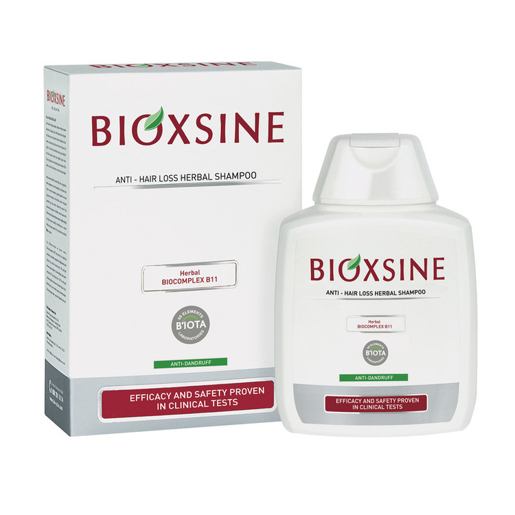 شامپو ضد ریزش و ضد شوره بیوتا مدل BIOXSINE حجم 300 میلیلیتر، تقویتکننده و تغذیهکننده مو با ویتامینها و مواد معدنی، مناسب انواع مو، کاملاً گیاهی و بدون مواد رنگی