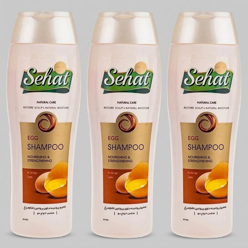 شامپو مو تقویتکننده صحت مدل تخم مرغ حجم 300 میلیلیتر بسته 3 عددی، حاوی عصاره تخم مرغ و گلیسیرین، مناسب انواع مو، افزایش مقاومت و نرمی مو و پوست سر، سرشار از پروتئین