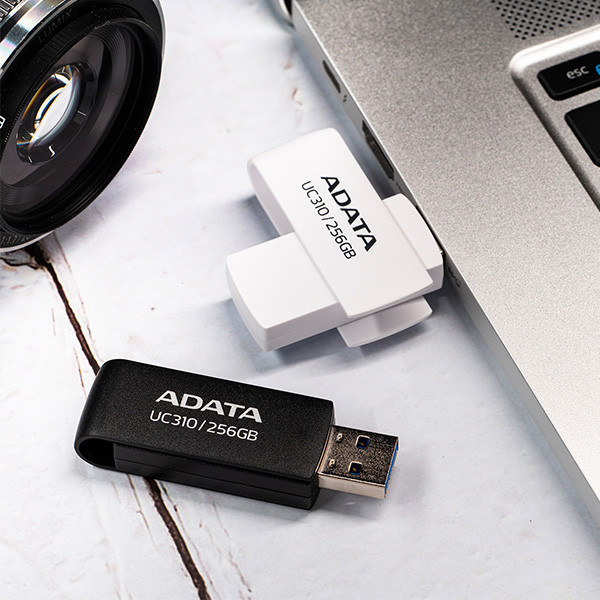 فلش مموری ای دیتا مدل UC310 ظرفیت 128 گیگابایت، سرعت خواندن تا 100 مگابایت بر ثانیه، سازگار با ویندوز، مک و لینوکس، طراحی ساده و وزن 9 گرم