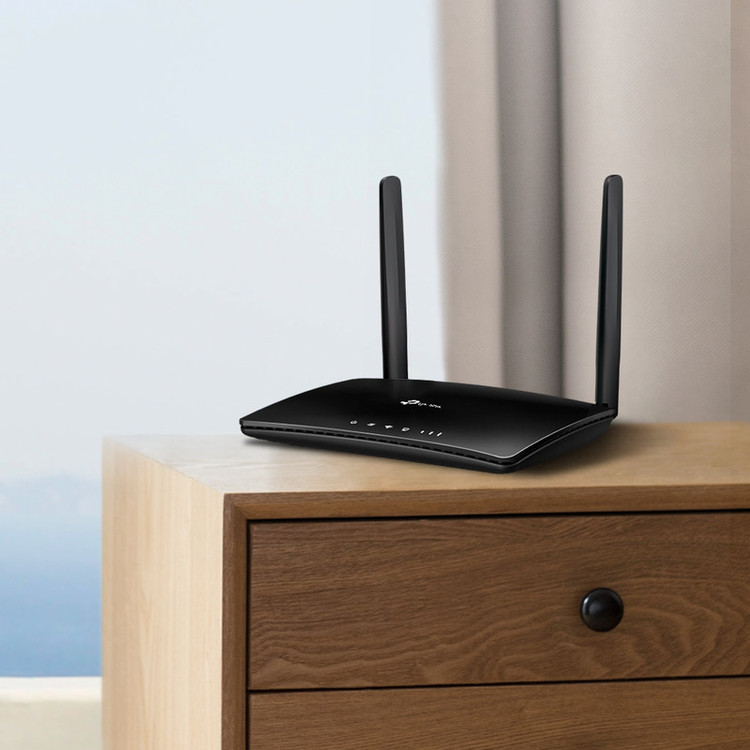 مودم روتر بیسیم 4G LTE تیپیلینک مدل TL-MR6400 با دو آنتن خارجی، شبکه Wi-Fi 2.4 گیگاهرتز، پشتیبانی از 32 کاربر، چهار پورت LAN 10/100 مگابیت و فایروال پیشرفته