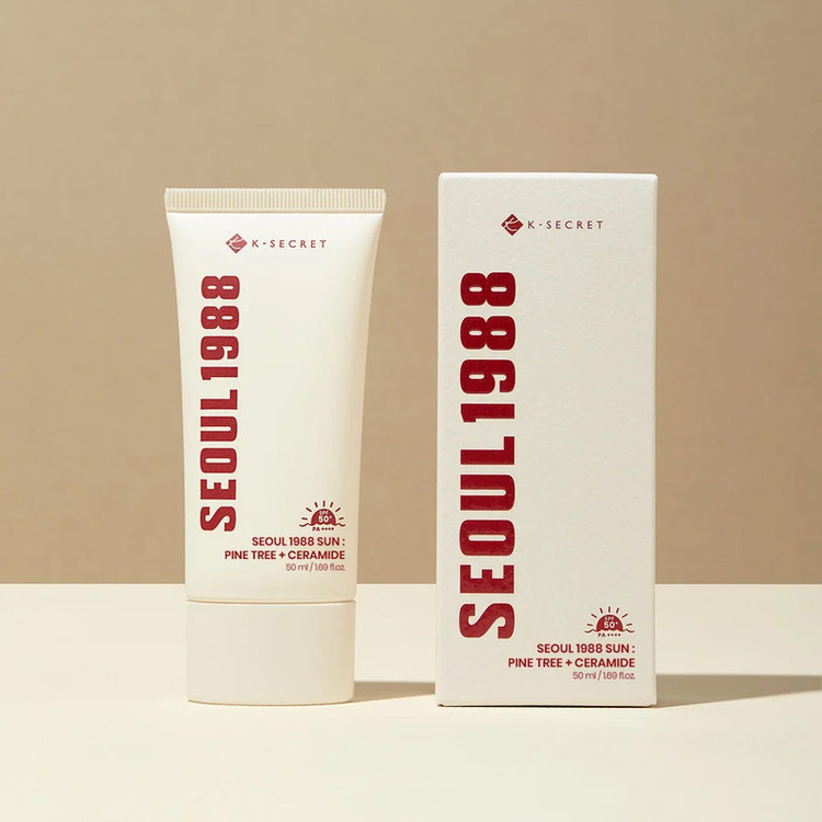 کرم ضدآفتاب بی رنگ صورت کی سکرت spf 50 مدل Seoul 1988 Pine Tree+ Ceramide مناسب برای انواع پوست حجم 50 میلی لیتر